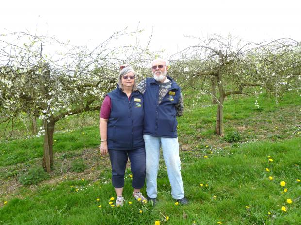 Colin and Monica in their orchard
