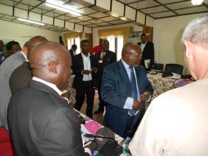 Mr Jean Muhiro, Minister for Home Affairs, greeting the members of the Organising Farmers Dialogue committee