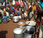 Adults and children are all waiting for soya milk and the doughnuts made of okra